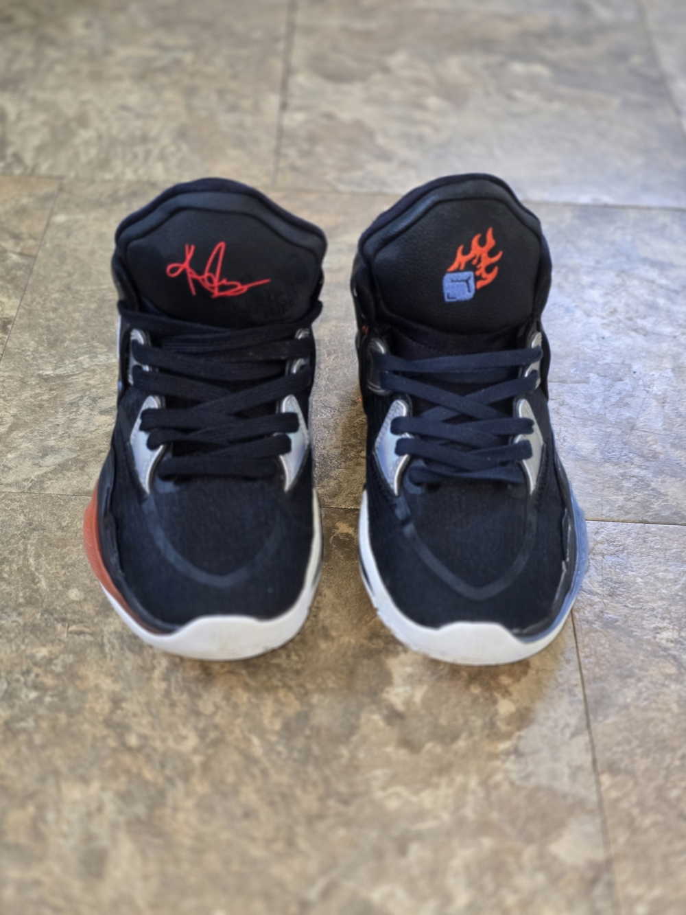 Nike Kids Black Sneakers with Red Flame Accent